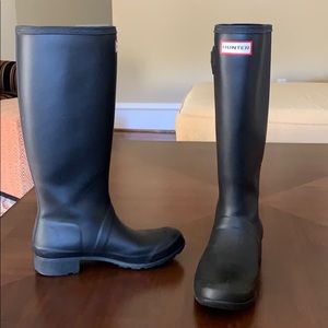 Black tall hunter rain boots